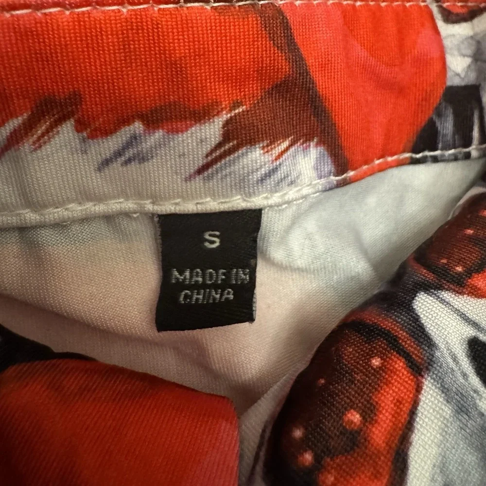 Festive Holiday Polo Shirt With‎ Skulls Wearing Santa Hats